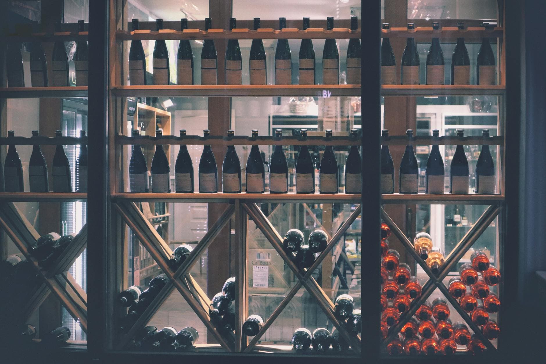 Wine and spirits bottles on shop shelves